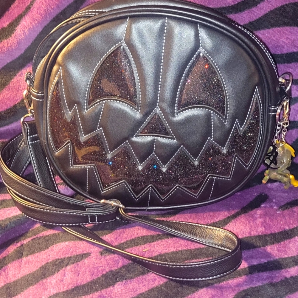 Love, Pain, and Stitches crossbody bag